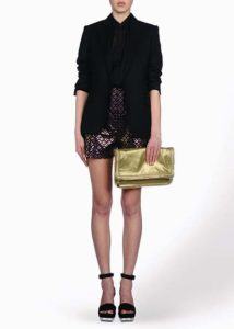Sustainable Black Jacket – Black shirt in silk / Paper – Short in organic cotton/ Plexi – Black Shoes/ Gold Falabela in faux leather