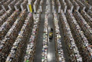 Image #: 25648312 A worker gathers items for delivery from the warehouse floor at Amazon's distribution center in Phoenix, Arizona November 22, 2013. The web-based retailer is preparing for Cyber Monday, which is traditionally the busiest day of the year for online purchases, and falls on December 2 in 2013. REUTERS/Ralph D. Freso (UNITED STATES - Tags: BUSINESS TPX IMAGES OF THE DAY EMPLOYMENT) REUTERS /RALPH D. FRESO /LANDOV