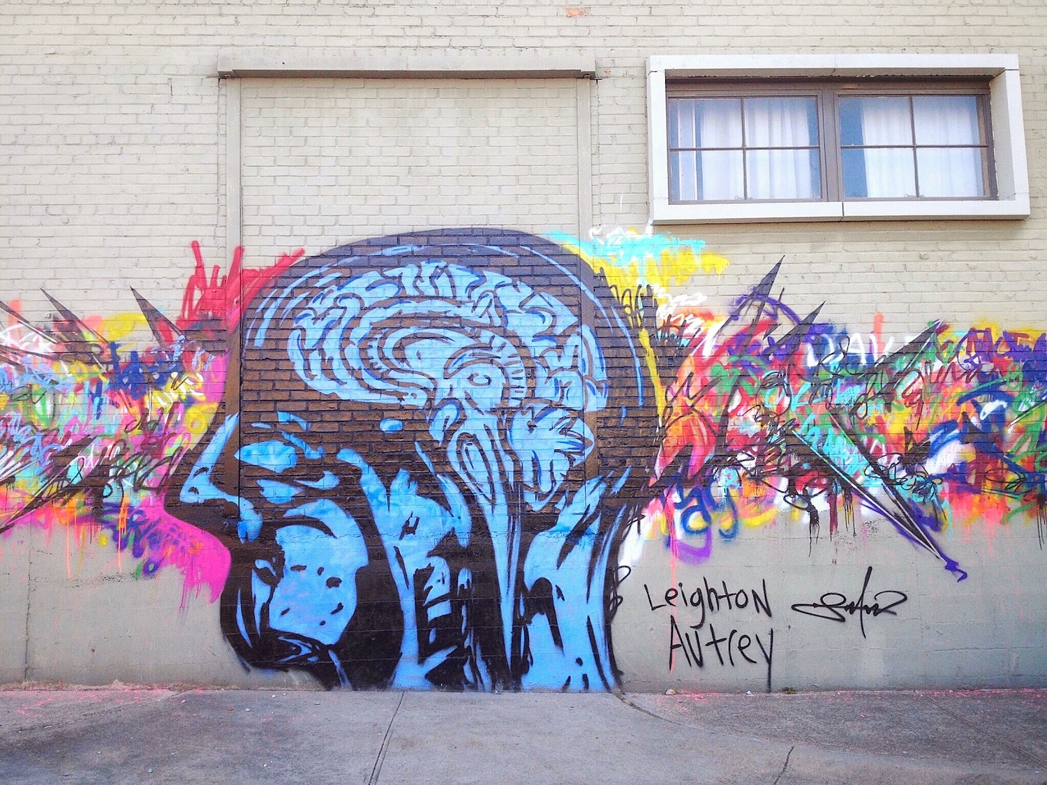 Wall graffiti of brain in chaos